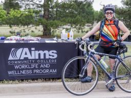 Woman on bike at Let's Bike Day at Aims
