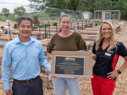 Plaque presentation at the Loveland Youth Gardeners, left to right Phong Tram, Jessica Morgan, and Megan Blaser.