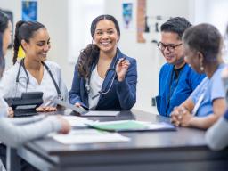 several medical professionals at a table