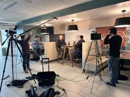 Film crew in with cameras creating a movie at Aims