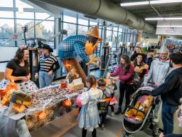 Families and students at Trick or Treat Track event