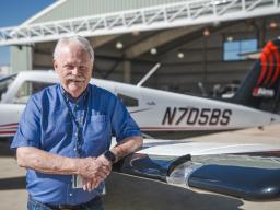 William Standerfer with Airplane at Aims