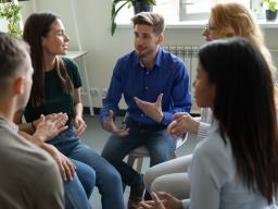 group therapy meeting, sitting in circle