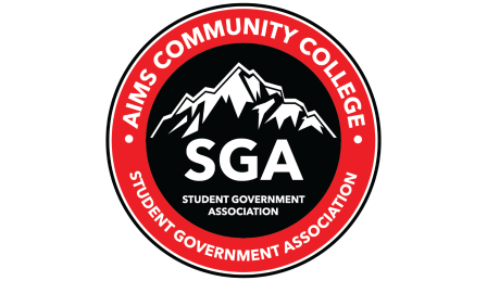 A round logo with the text SGA in the middle and a black and white image of a mountain.