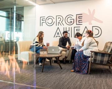 Students gathers in the lounge area of the Student Commons.  