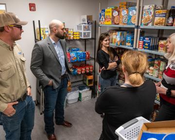 Tour of Arty's Pantry storage with shelves of food