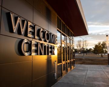 Welcome Center Building and entrance at Sunset.