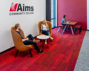 People sitting in the Welcome Center Lobby