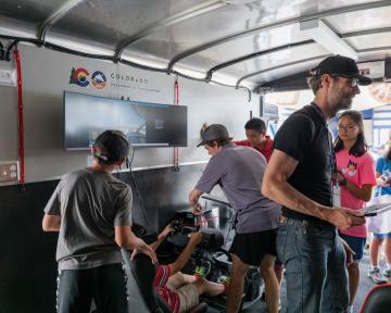 people inside the mobile aviation lab