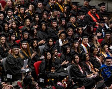 Aims grads at Commencement