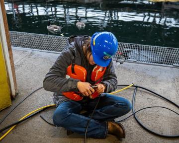 Rylen connecting a hose