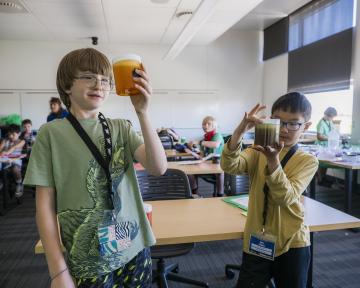 students with drinks at C4K