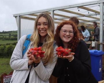 students with fresh strawberries in Ireland