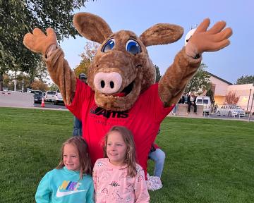 Arty with two girls at Aims balloon launch