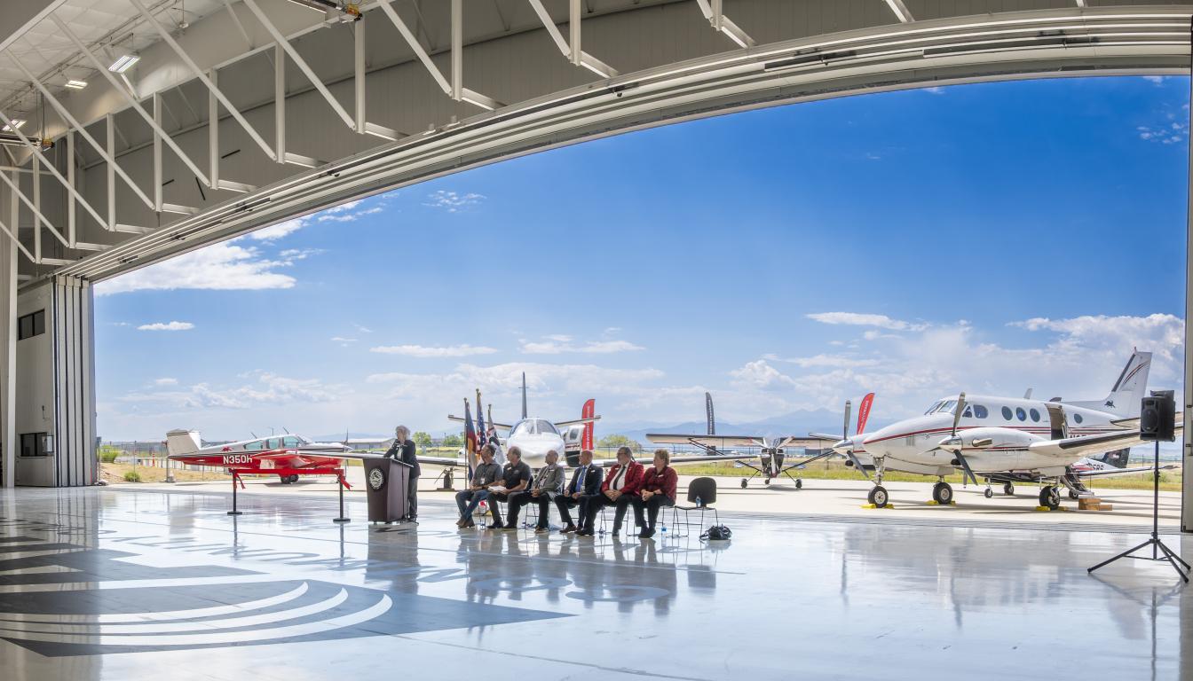 Aims AMTC Ribbon cutting event podium
