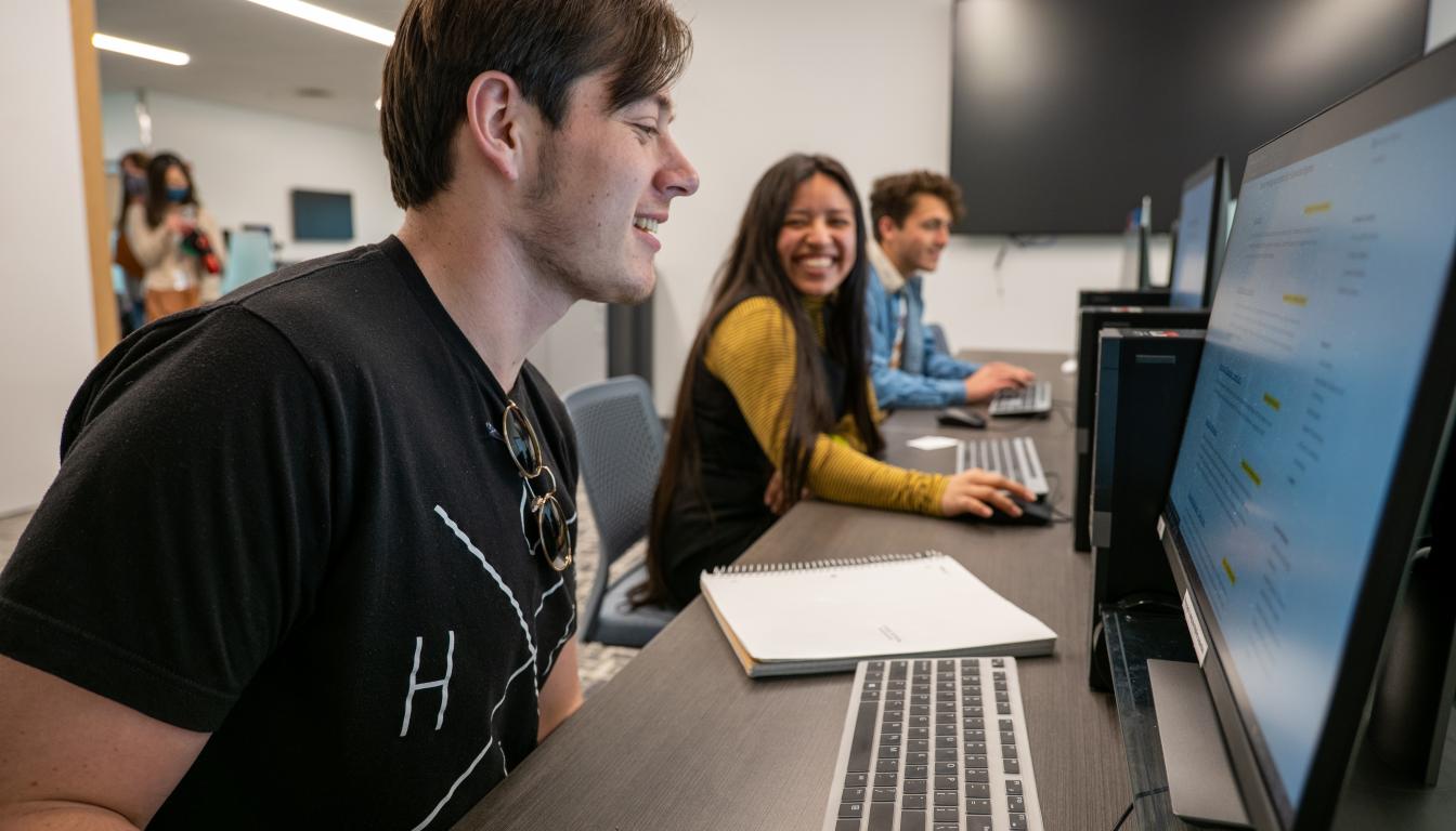 Aims students using computers in the Greeley Campus Learning Commons computer lab