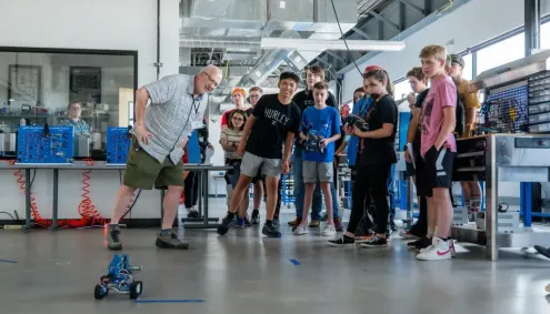 Students &amp; Instructor test robots at BEST