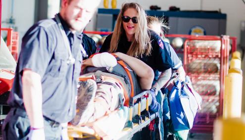 Aims EMT Students Wheel person on a gurney