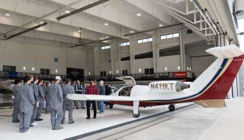 Aims students inspect donated jet