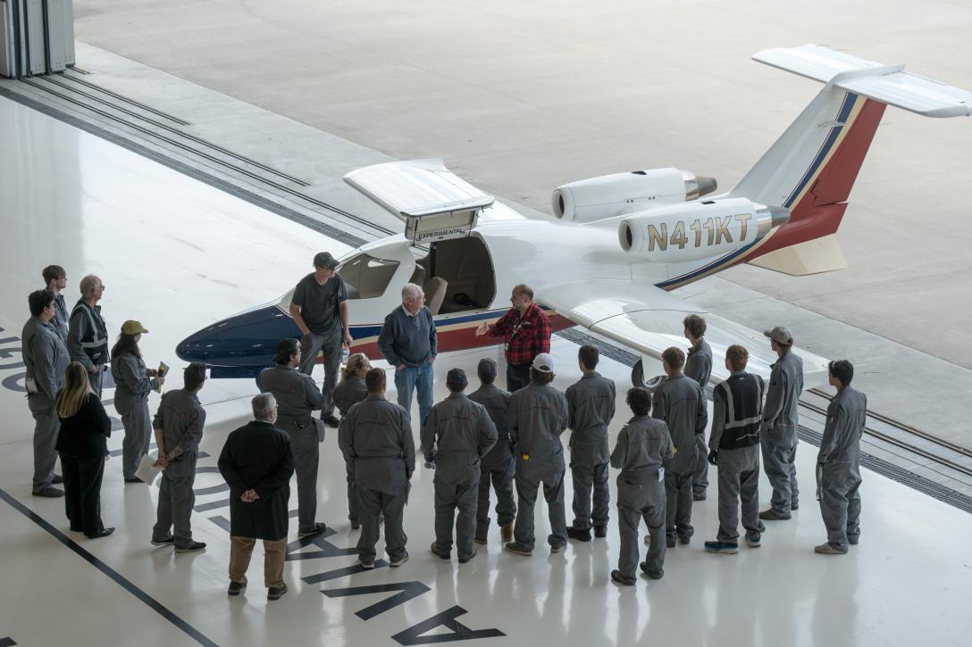 Maverick TwinJet 1500 with crowd looking at it as Seavall and Sasso speak