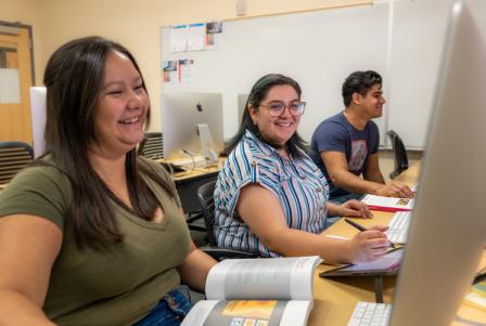 Students working at computers in a computer lab