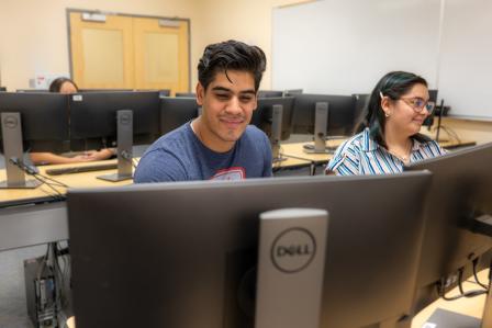 Student working at a computer in classroom