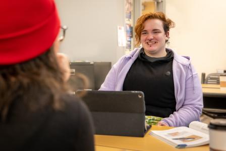 Students working together at a desk