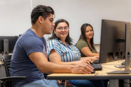 Aims students working on computers