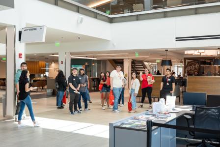 Aims students taking tour as part of orientation